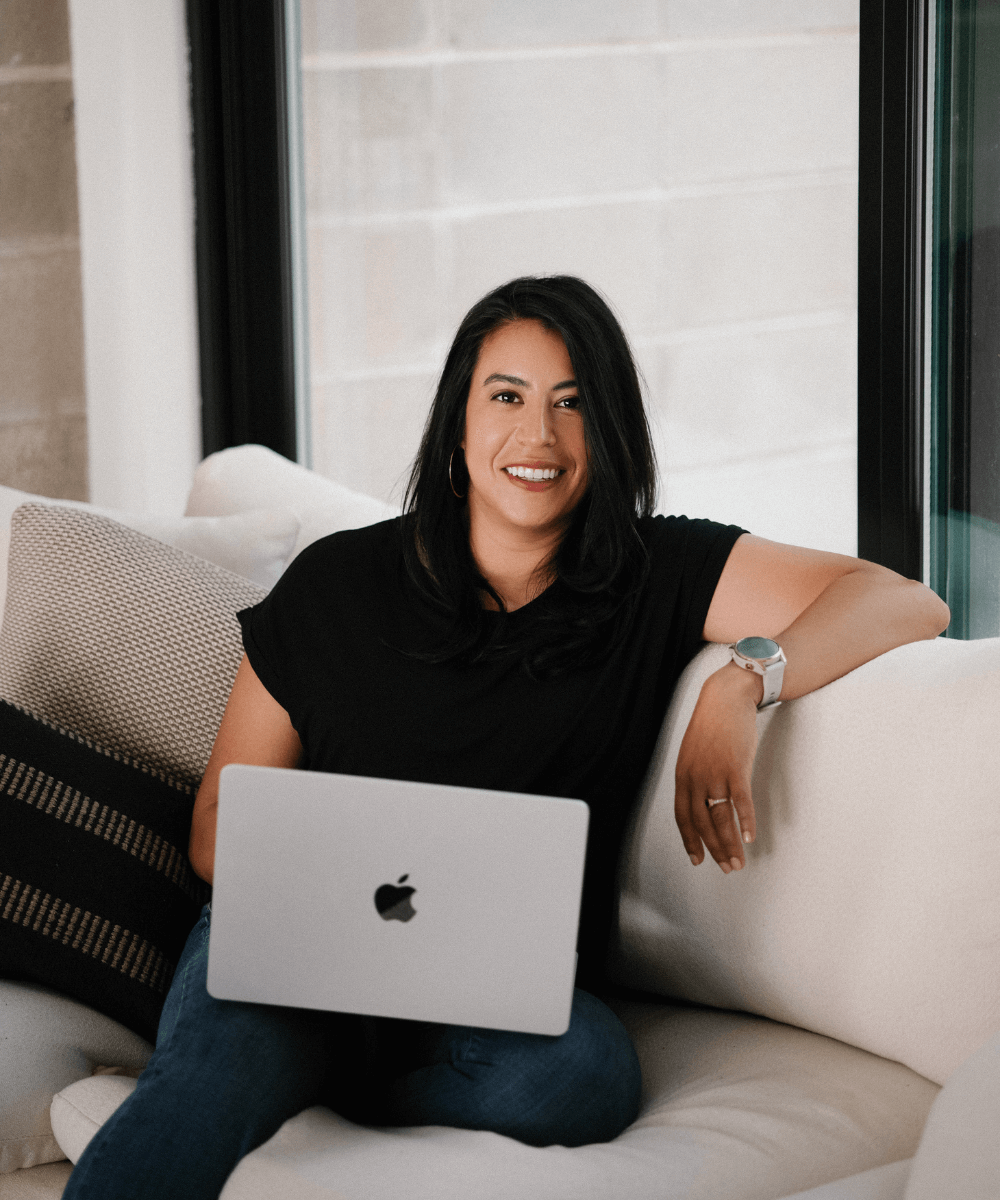 olivia lawson google ads specialist in austin sitting on a couch